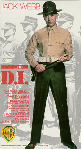 Jack Webb, the Marine drill instructor starring in the 1957 movie "The D.I".brandishes a swagger stick.