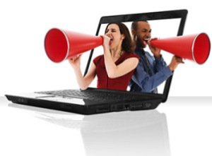 a black laptop computer with a red megaphone